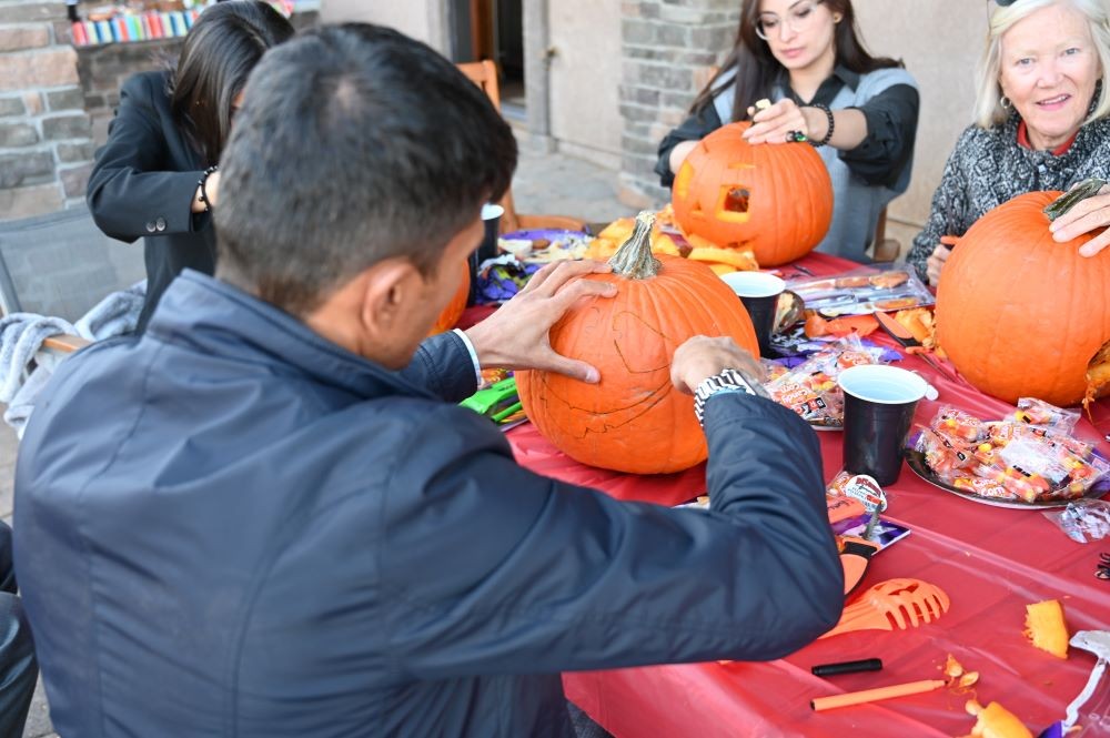 A delegate's first time carving a pumpkin to celebrate the fall season in Colorado Springs, USA!